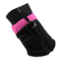 Black and pink dog winter puffer jacket featuring a zip closure and a harness ring, showcasing a quilted design.