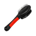 Double-sided grooming brush with a black and red ergonomic handle, featuring metal bristles on one side and soft bristles on the other.