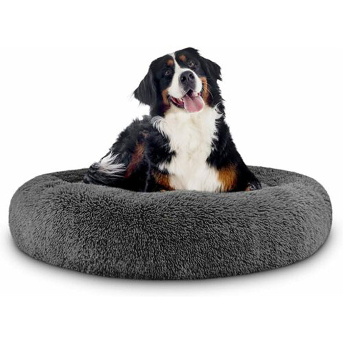 Round, soft gray pet bed with a fluffy texture, featuring a happy dog comfortably sitting inside.